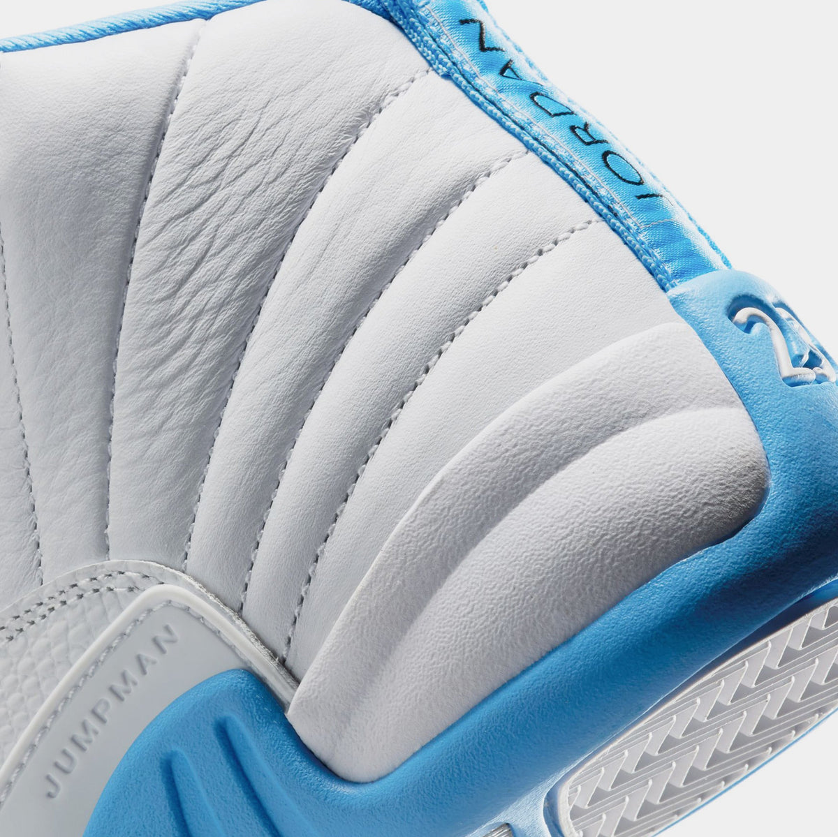 Exclusive Air Jordan 12 Retro White and University Blue Grade School Lifestyle Shoes (White/University Blue/Metallic Silver) — 3.5Y — Lifestyle View