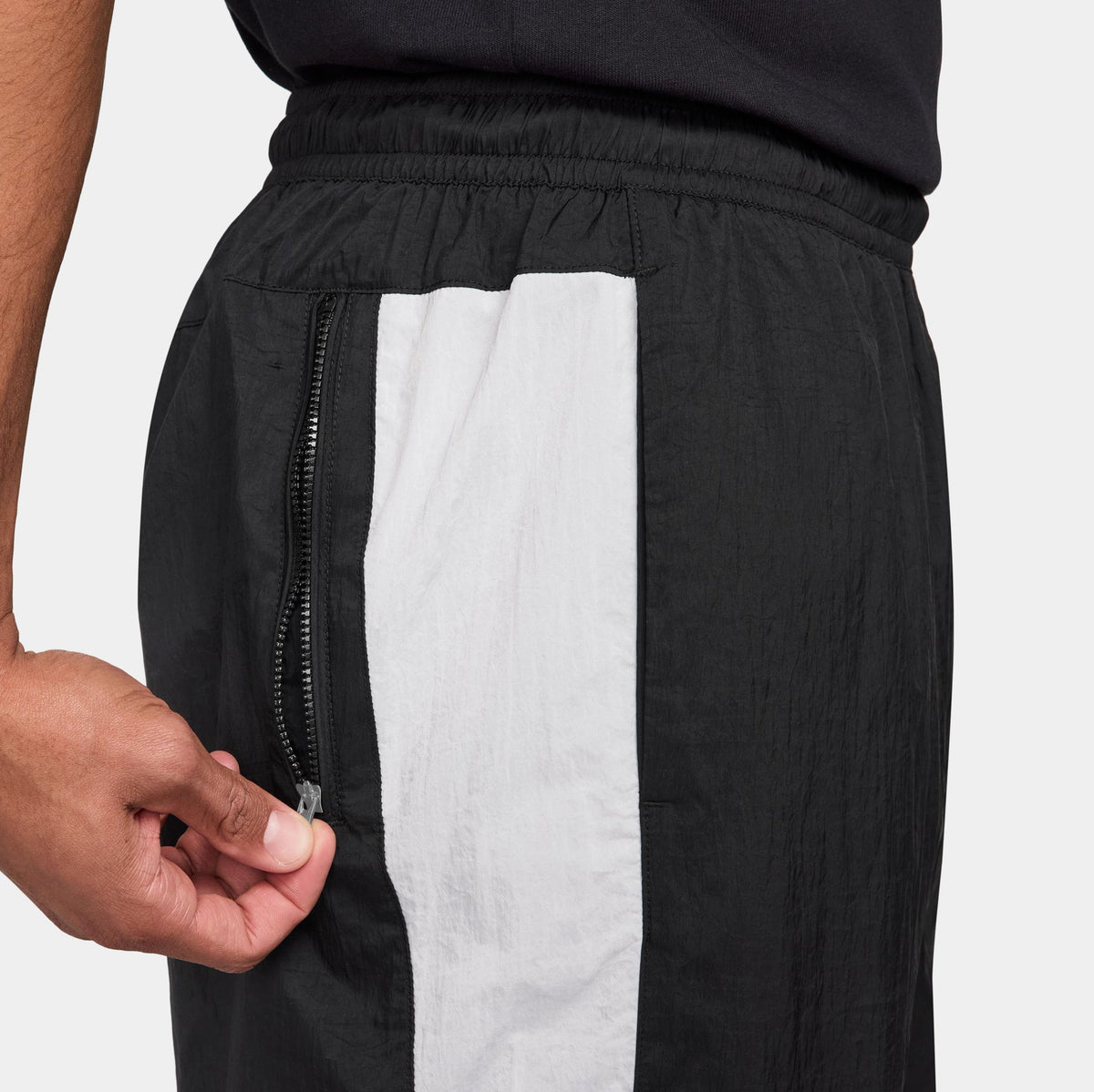 Exclusive NSW Air Woven Track Mens Pants (Black/White/White) — S — Back View