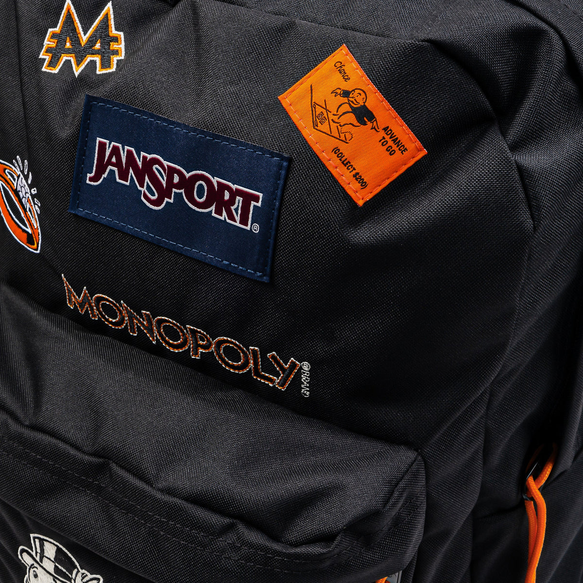 Exclusive Shoe Palace x Jansport x Monopoly Chance Mens Backpack (Black/Orange) — OS — Detail View