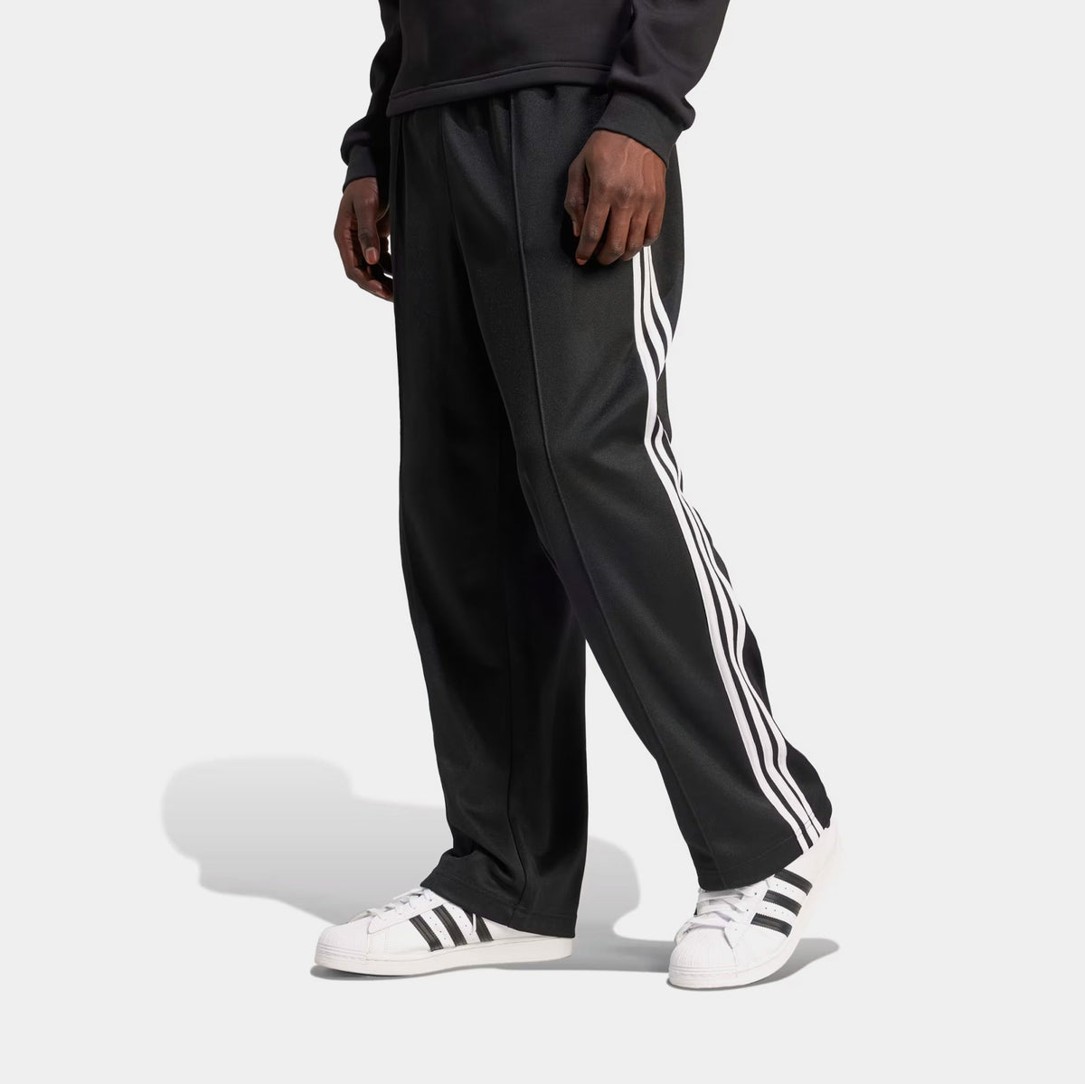 Exclusive Adicolor Baggy Firebird Track Mens Pants (Black) — S — Front View