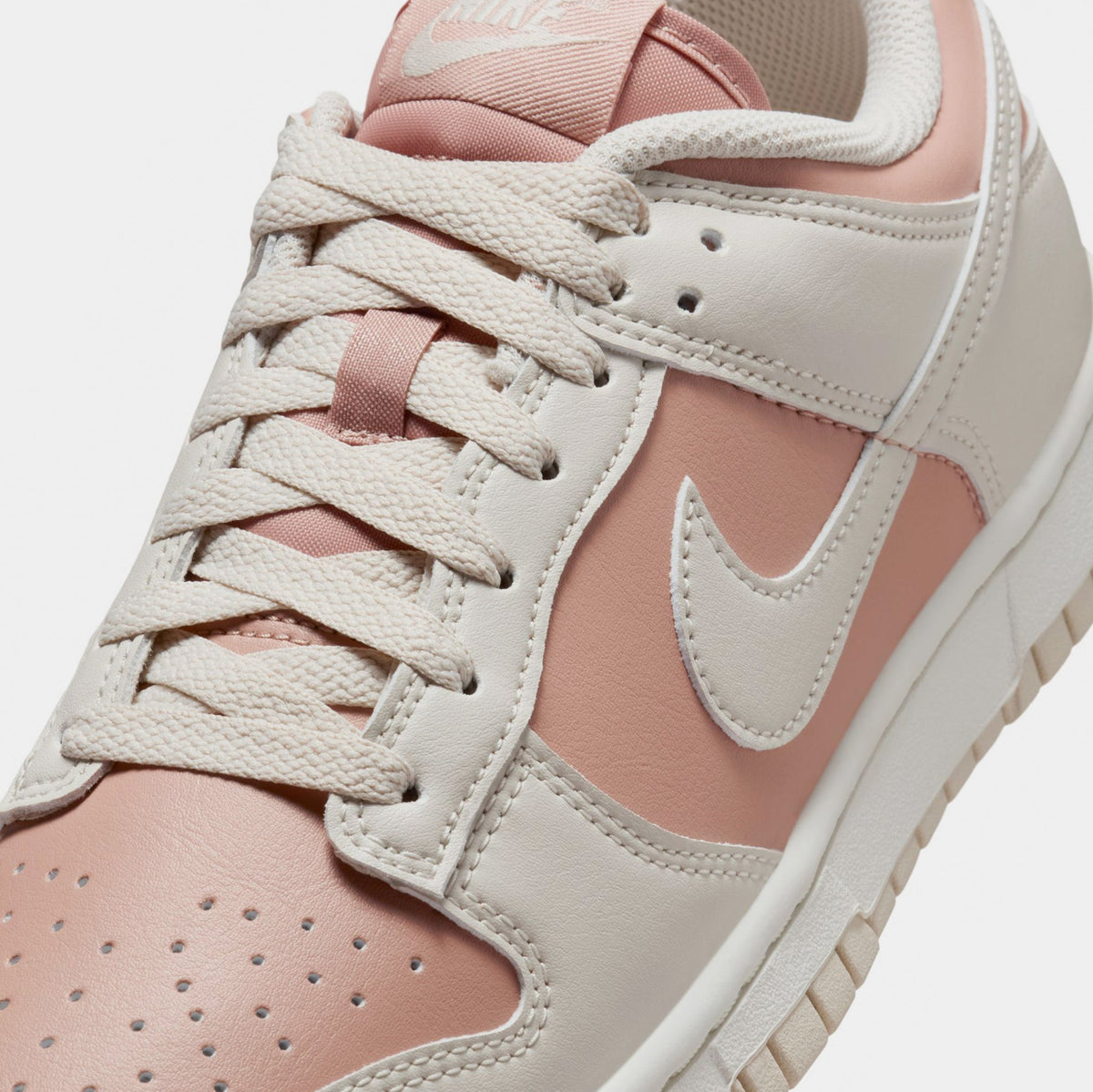 Exclusive Dunk Low Womens Lifestyle Shoes (Particloe Pink/Light Orewood Brown) — 5 — Detail View