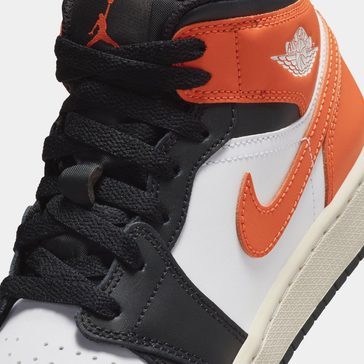 Exclusive Air Jordan 1 Mid Grade School Lifestyle Shoes (Starfish/White/Sail/Black) — 3.5Y — Detail View